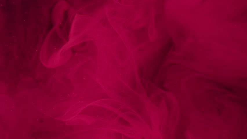 Mystical paint. Magenta flow. Foggy colored blur on dark abstract background. Ink smoky dissolves in water mixing with small pink particles liquid.