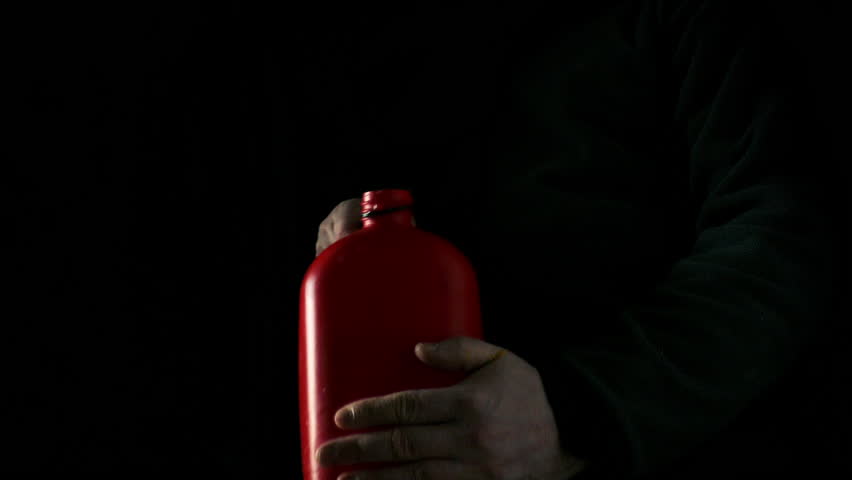 Man Pours Gasoline Over The Ground