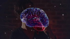 Male researcher raising chin in lab, examining smartwatch tech data icons with holographic brain. Futuristic, technology, innovation, neuroscience, digital, networking, data - Powered by Shutterstock - Get 15% off with code: PIKWIZARD15