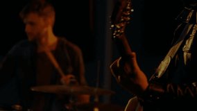 Male singer leaning into vintage mic in music studio, featuring light and animated spark effects. Performance, sound, entertainment, vintage, artistry, expression, stage - Powered by Shutterstock - Get 15% off with code: PIKWIZARD15