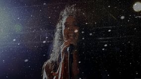 female singer gripping microphone on dark stage, performing music industry with animated confetti. Performance, concert, vocal, celebration, elegance, nightlife, ambiance - Powered by Shutterstock - Get 15% off with code: PIKWIZARD15