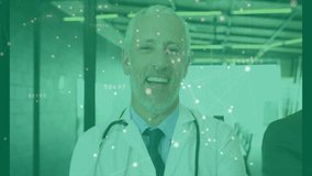 Medical team wearing lab coats, stethoscopes, suits in corridor showing digital data nodes overlay. Collaboration, healthcare, technology, professionalism, innovation, teamwork, modern - Powered by Shutterstock - Get 15% off with code: PIKWIZARD15