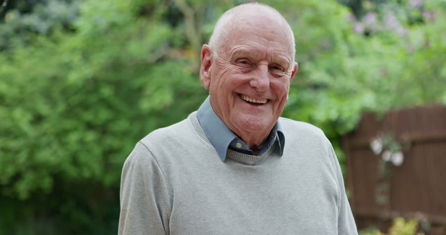 Face, outdoor and senior man with a smile, peace and Canada with happiness, nature or wellness. Portrait, pensioner or elderly person with gratitude, retirement or calm in the garden, cheerful or joy