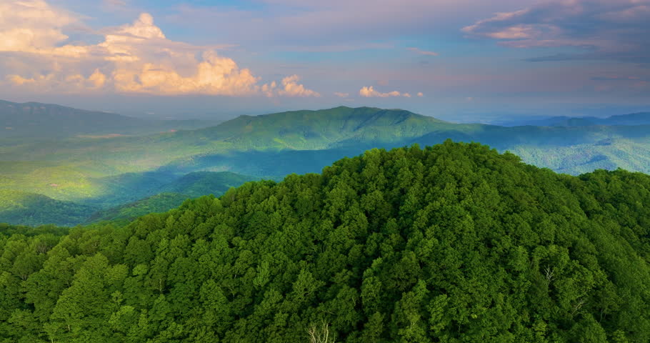 Bright sunrise in North Carolina Appalachian mountains in summer season. Summertime landscape of beautiful nature