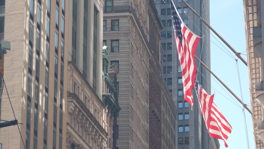 New York City Lower Manhattan, Downtown Financial District street architecture, United States. High-rise skyscrapers, residential, office buildings, american flag. Real estate, USA realty. FiDi towers