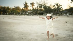 Young child runs playfully on a quiet beach, expressing freedom, joy, and pure childhood energy in soft natural light and warm, relaxed tropical atmosphere. - Powered by Shutterstock - Get 15% off with code: PIKWIZARD15