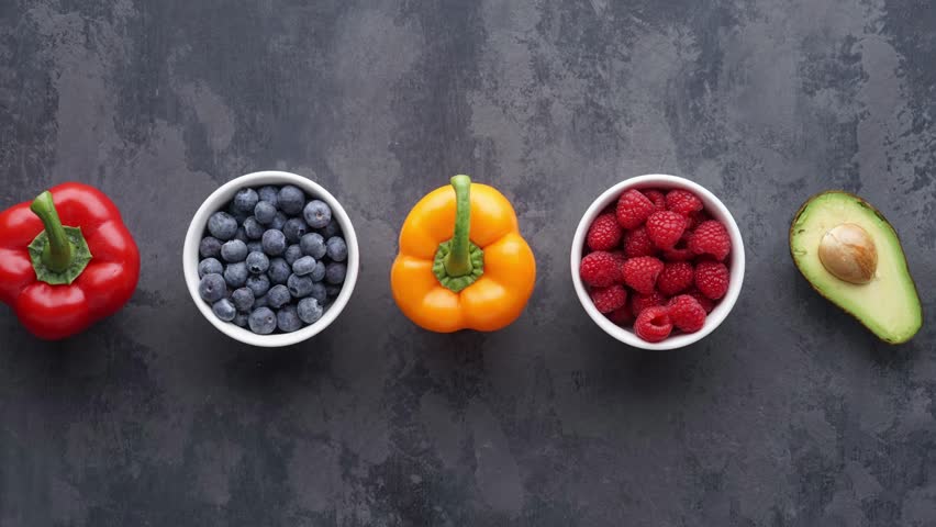 Healthy eating ingredients: fresh vegetables, fruits and superfood. Nutrition, diet, vegan food concept.