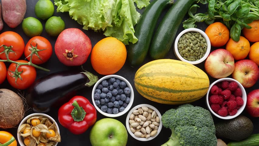 Healthy eating ingredients: fresh vegetables, fruits and superfood. Nutrition, diet, vegan food concept.