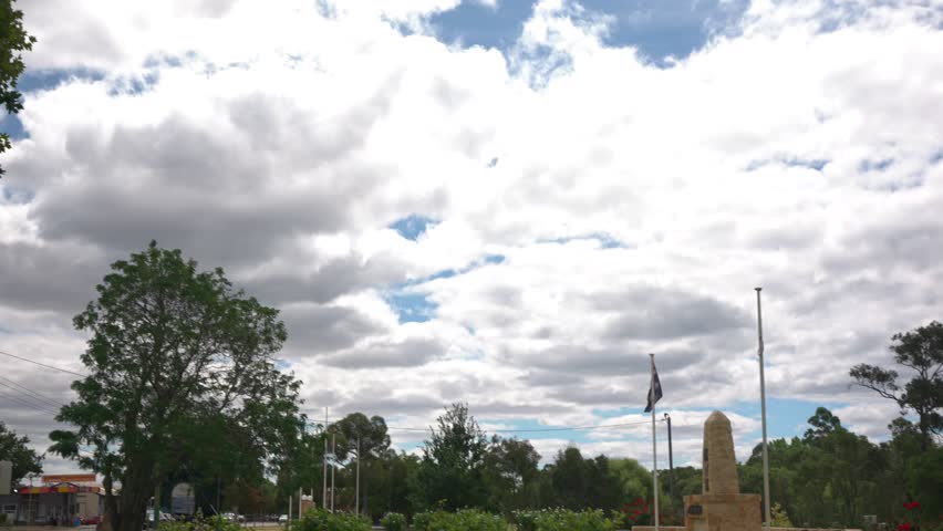 Pan across the Donnybrook park that holds the ANZAC War memorial and the Australian flag.