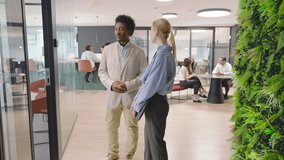 In a corporate office, a diverse team collaborates on financial data and sales reports to strategically plan and achieve their business objectives, enhancing productivity and performance - Powered by Shutterstock - Get 15% off with code: PIKWIZARD15