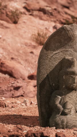 Ancient Statue on the Rocks Desert
