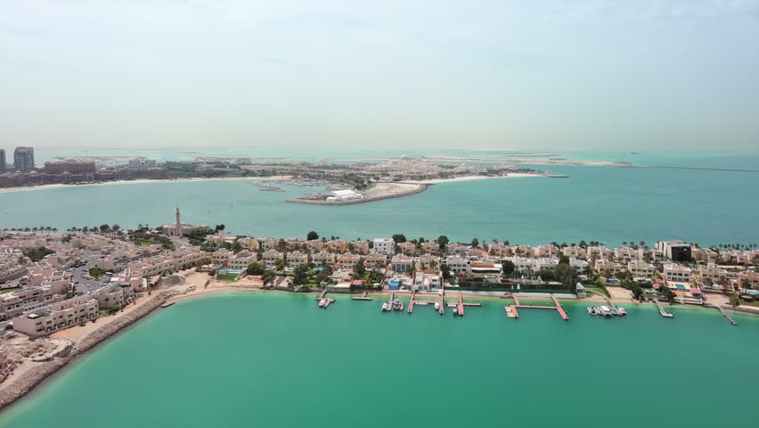 Abu Dhabi, United Arab Emirates: Aerial view of capital city of UAE - landscape panorama of Arabian Peninsula from above