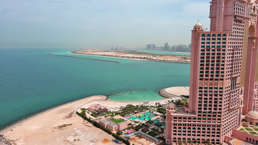 Abu Dhabi, United Arab Emirates: Aerial view of capital city of UAE - landscape panorama of Arabian Peninsula from above