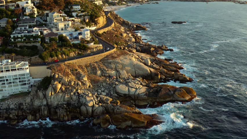 Sunset in Capetown south africa with coastal roads and ocean