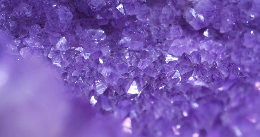 Natural amethyst crystal geode. Purple amethyst geode - small cavity in rock lined with crystals or other mineral matter. Amethyst - mineral of quartz group. Stones and minerals, riches of Earth