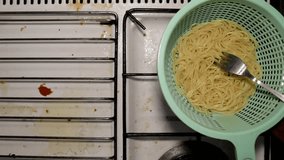 Cooked boiled pasta in a strainer ready to be mixed with seasoning - Powered by Shutterstock - Get 15% off with code: PIKWIZARD15