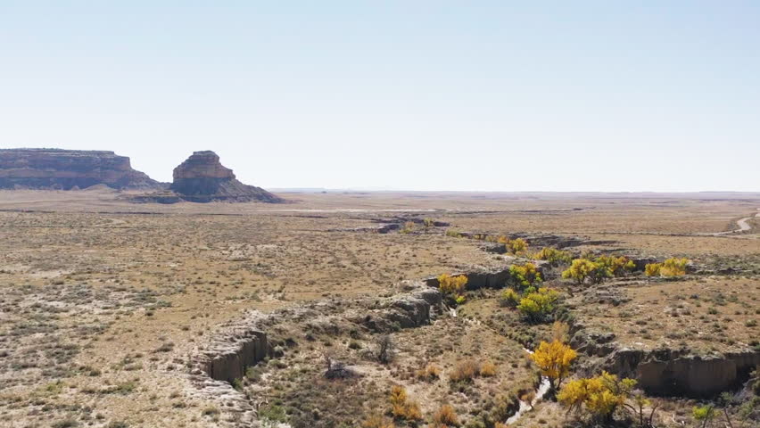 Vast, arid terrain and geology of Chaco Canyon, featuring Fajada Butte