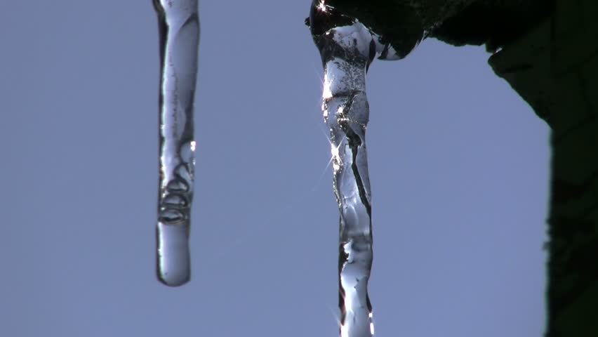 Melting icicle with air bubbles