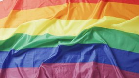 Rainbow Pride flag waving under floating heart reactions and heart-eye emojis across stripes. Lgbtq, celebration, digital art, vibrant, social media, activism, equality - Powered by Shutterstock - Get 15% off with code: PIKWIZARD15