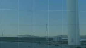 Wind turbine tower occupying center, displaying translucent data charts with grid map overlay. Renewable, technology, analytics, digital, sustainability, innovation, engineering - Powered by Shutterstock - Get 15% off with code: PIKWIZARD15