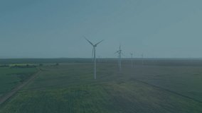 Central wind turbine being surrounded by translucent green stock tickers and scrolling line graphs. Sustainability, renewable, technology, analytics, environment, innovation, economy - Powered by Shutterstock - Get 15% off with code: PIKWIZARD15