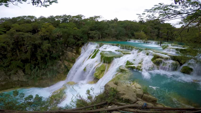 Turquoise water flows over the rocks at el salto waterfall in san luis potosi, mexico