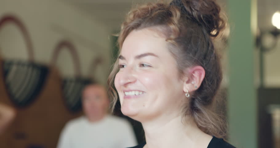 Yoga teacher, woman talking and wellness teaching with class and communication in gym studio. Advice and balance with helping and spiritual coaching of pilates with person trainer and mindfulness