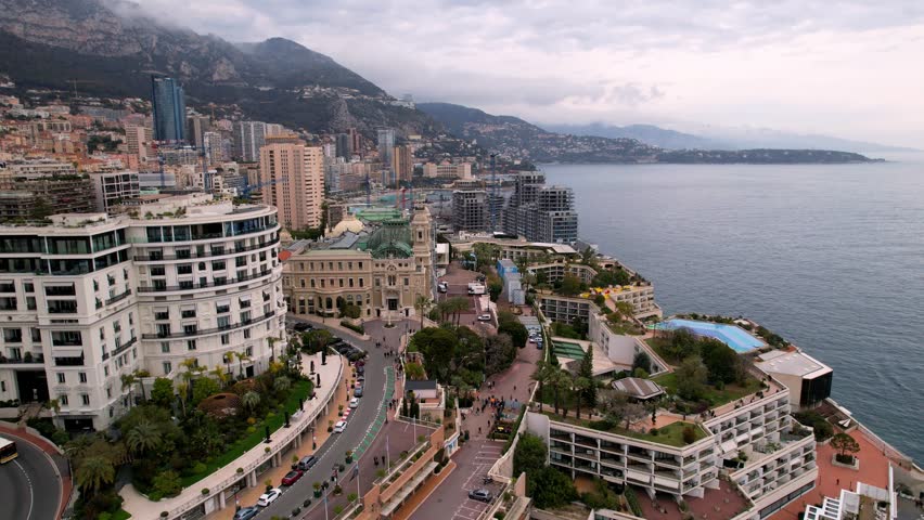 Stunning drone footage of Monte Carlo. Experience elegance of world renowned casinos, luxurious yachts, and breathtaking coastal views. Ideal for travel, lifestyle, and luxury themed projects.