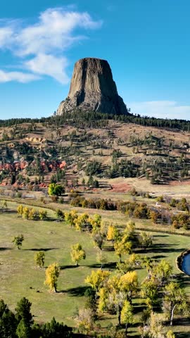 Aerial shot of the amazing Devils Tower National Monument in Wyoming. Vertical video.