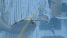 Engineer presenting tablet data in tech office, overlaying wind turbine model with animated graphs. Renewable, innovation, teamwork, technology, sustainability, analysis, modern - Powered by Shutterstock - Get 15% off with code: PIKWIZARD15