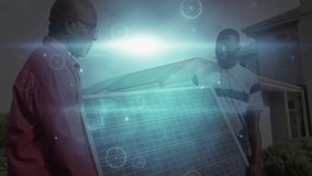 Senior technician and junior technician carrying solar panel in front yard, showing data charts. Renewable, innovation, teamwork, environmental, technology, sustainability, analysis - Powered by Shutterstock - Get 15% off with code: PIKWIZARD15