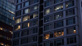 Office And Apartment Windows Glow At Dusk In Gangnam, Seoul. South Korea. low angle, panning shot - Powered by Shutterstock - Get 15% off with code: PIKWIZARD15