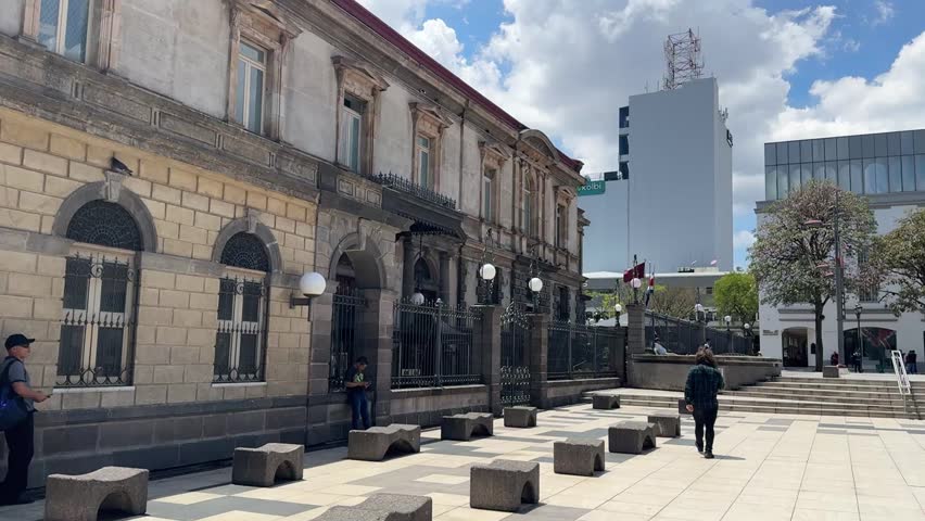 San José, Costa Rica - 04.12.2025: Urban scenes of the capital city featuring historic architecture, public transport, local streets, and daily life