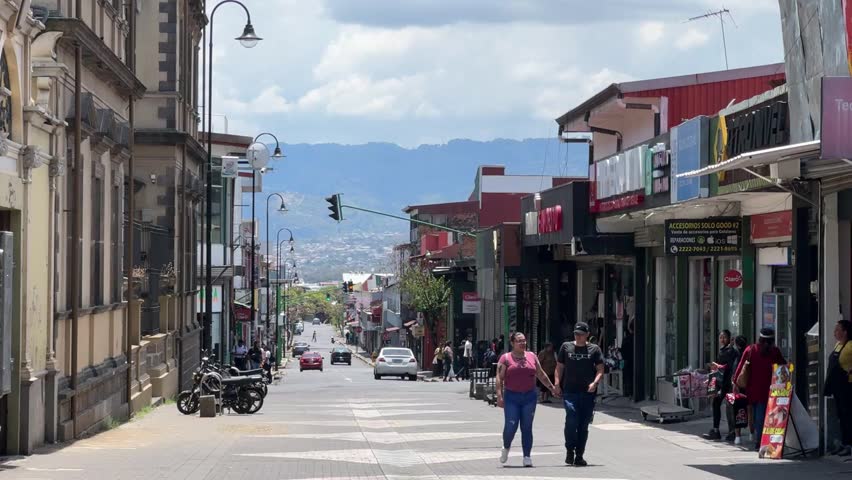 San José, Costa Rica - 04.12.2025: Urban scenes of the capital city featuring historic architecture, public transport, local streets, and daily life