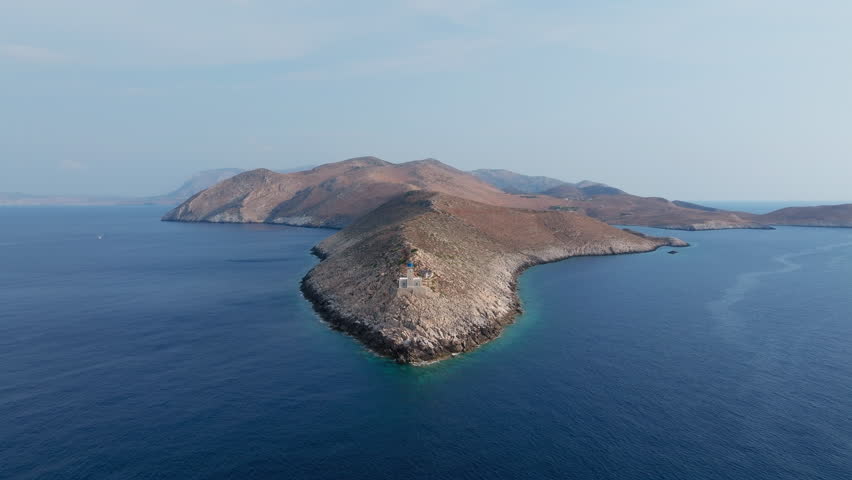 Slow panning drone shot of cape Tainaron lighthouse in Mani, Greece, Cape Tenaro (Cape Matapan)