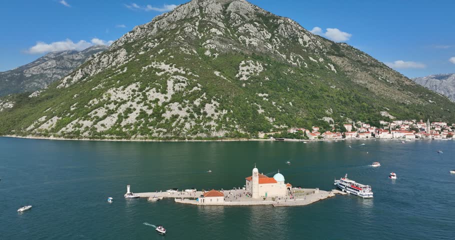 Drone view of the Monastery of Our Lady of Mercy in Montenegro on a sunny summer day.