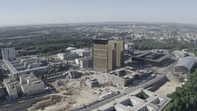 D-Log. Luxembourg City, Luxembourg. Kirchberg district with European Union institutions and modern architecture under cloudy skies, Point of interest. Aerial view - Powered by Shutterstock - Get 15% off with code: PIKWIZARD15