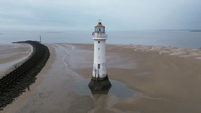 360° arial spin round a lighthouse. New Brighton Beach Merseyside - Powered by Shutterstock - Get 15% off with code: PIKWIZARD15