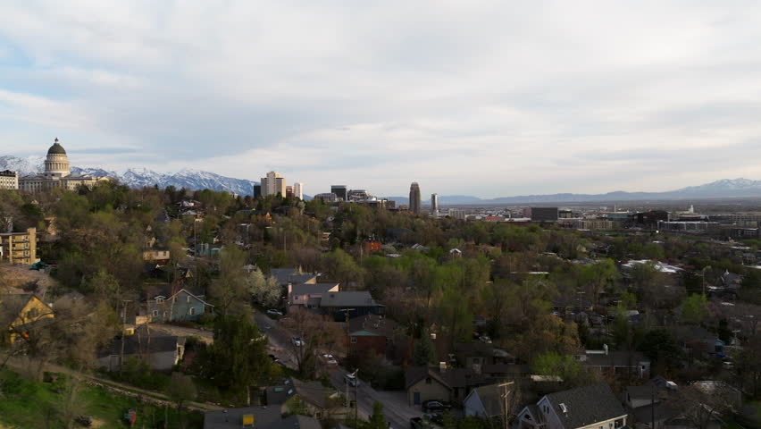 Flying Over The Hillside Town With Utah State Capitol And Downtown In The Background In Salt Lake City, Utah, USA. - aerial shot