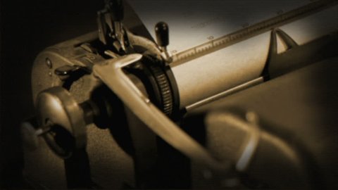 Dramatic camera movement while showing details of a typewriter