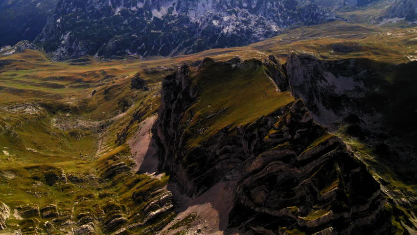 Aerial Forward Scenic Shot Of Green Mountain Range On Sunny Day - Durmitor, Montenegro