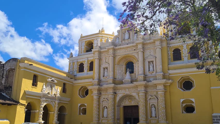 Exterior of Catholic Church and Convent of La Merced, Landmark of Antigua Guatemala on Sunny Day