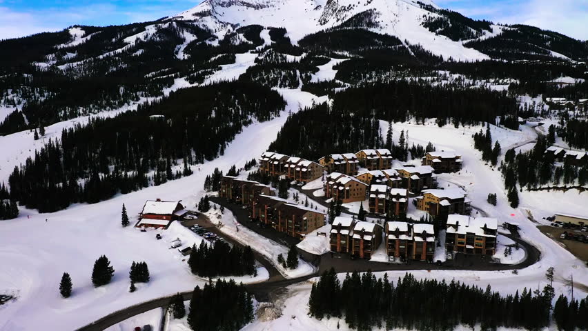 Aerial of the mountain in late spring at Big Sky Ski resort, Montana, US