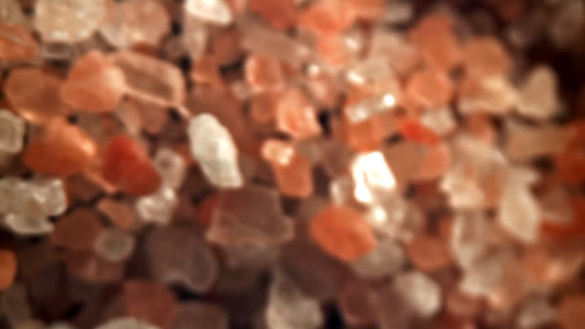 The pink salt flies up and down. Filmed on a high-speed camera at 1000 fps. High quality FullHD footage