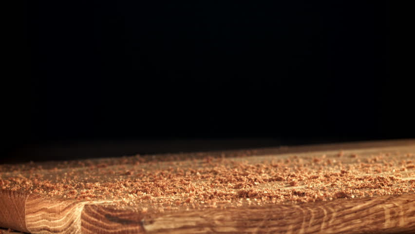 Oatmeal cookies fall on a wooden board. Filmed on a high-speed camera at 1000 fps. High quality FullHD footage