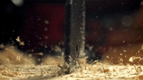 A carpenter drills a hole in a wooden product. Filmed on a high-speed camera at 1000 fps. High quality FullHD footage - Powered by Shutterstock - Get 15% off with code: PIKWIZARD15