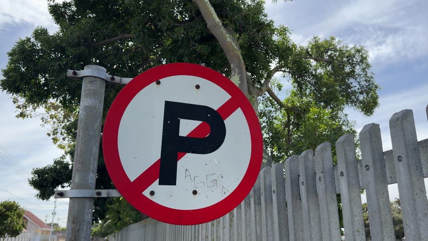 A no parking sign on a street in Cape Town.