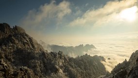Sunrise time lapse looking out over a sea of fog at the Yellow Mountains (Huangshan) in China - Powered by Shutterstock - Get 15% off with code: PIKWIZARD15