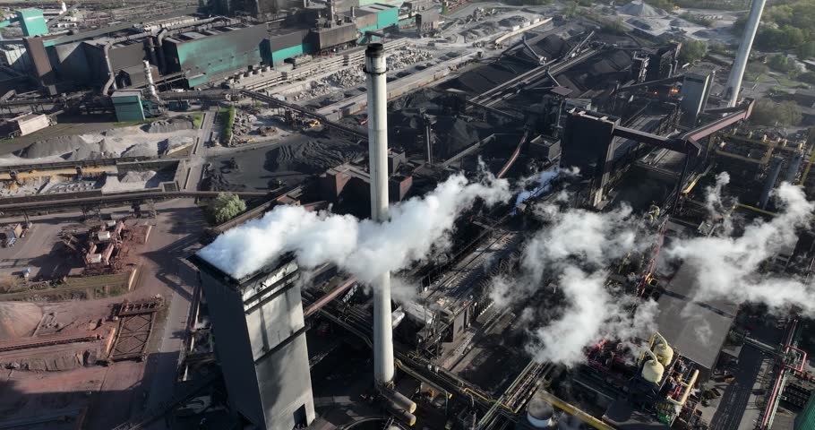 cokes oven, blast furnace, metal production. Industrial facility, chimney, smoke stacks. Aerial view.
