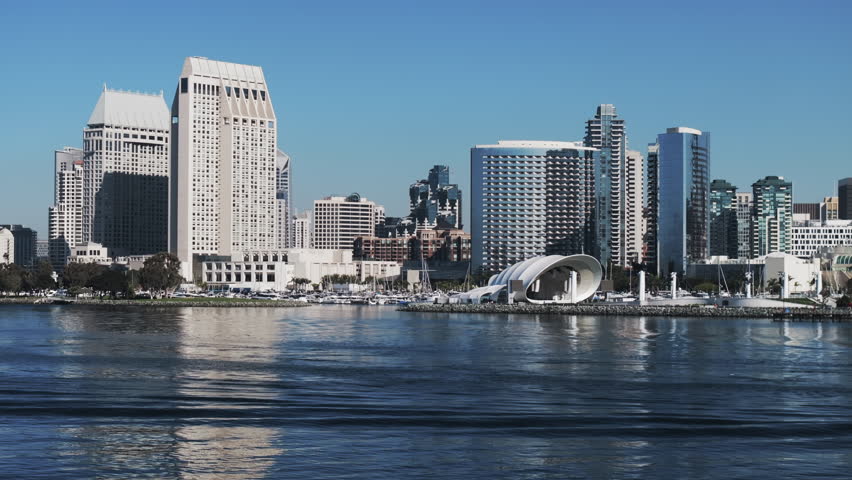 Aerial Shot Of The Rady Shell In Modern City, Drone Ascending Forward Over Sea On Sunny Day - San Diego, California